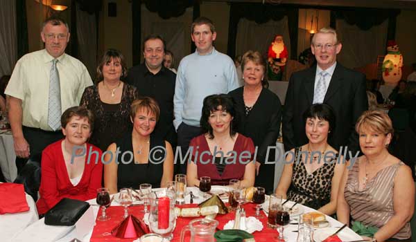 Pictured at the Irish Wheelchair Association Christmas Party night in the Failte Suite Welcome Inn Hotel Castlebar, front from left: Caroline Madden, Geraldine Walsh,  Martina Reid, Mary O'Boyle, and Bridie O'Connor; At back: Eamon Mellee, Carmel Monaghan,  Keith Irving,  Tony Cunningham, Colette Kilcourse and Peter Kennedy. Photo:  Michael Donnelly