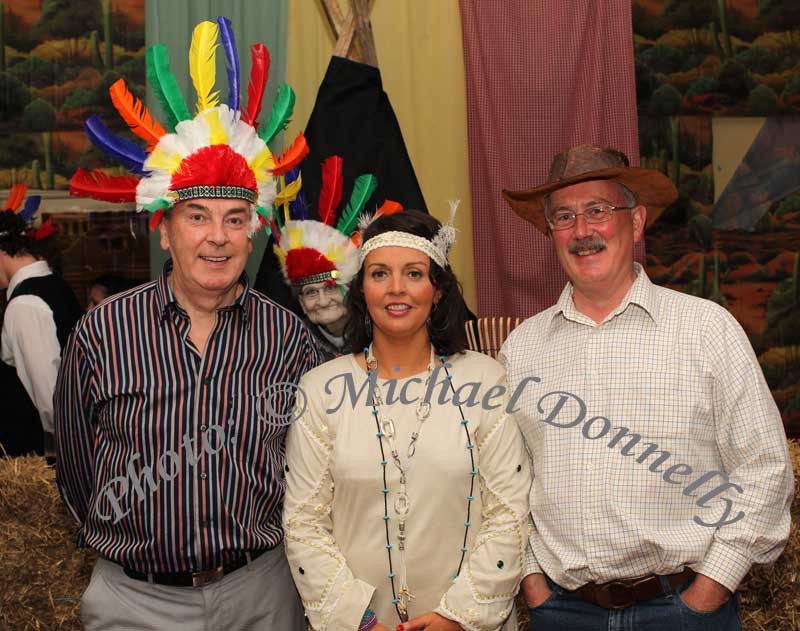 Pictured at the Castlebar Rotary President's Wild West Party night 2010 (Caroline Costello) from left: Jack Cunningham, District Governor Nominee Rotary Internaltional (Ireland), Caroline Costello, President Castlebar Rotary and Joseph Martin, President Rotary Sligo.  Photo: © Michael Donnelly
