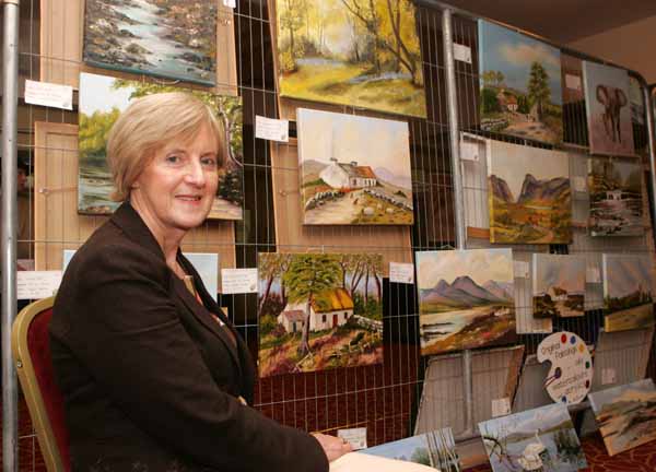 Angela Brady, Castlerea pictured with some of her exhibits at the Castlebar Rotary Club at the Castlebar Rotary Club Art sale (in conjunction with the Mayo Pink Ribbon Appeal) in Breaffy House Hotel, Castlebar. Photo:  Michael Donnelly