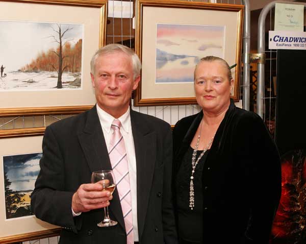 Arnold Wymen pictured with Dolores Burke President Castlebar Rotary Club at the Castlebar Rotary Club Art sale (in conjunction with the Mayo Pink Ribbon Appeal) in Breaffy House Hotel, Castlebar. Photo:  Michael Donnelly