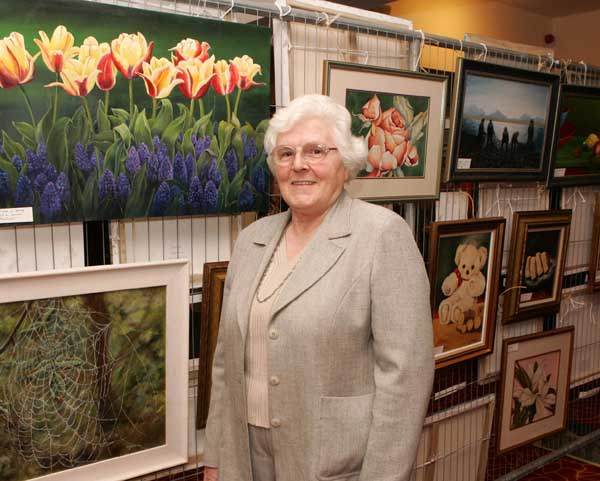 Artist Elsie Jackson Charlestown pictured with some of her exhibits at the Castlebar Rotary Club at the Castlebar Rotary Club Art sale (in conjunction with the Mayo Pink Ribbon Appeal) in Breaffy House Hotel, Castlebar. Photo:  Michael Donnelly