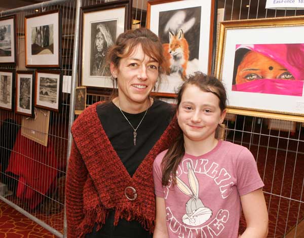 Fi Farren Artist, Moygownagh and Autumn Farren Barton, pictured with some of her exhibits at the Castlebar Rotary Club at the Castlebar Rotary Club Art sale (in conjunction with the Mayo Pink Ribbon Appeal) in Breaffy House Hotel, Castlebar. Photo:  Michael Donnelly