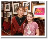 Fi Farren Artist, Moygownagh and Autumn Farren Barton, pictured with some of her exhibits at the Castlebar Rotary Club at the Castlebar Rotary Club Art sale (in conjunction with the Mayo Pink Ribbon Appeal) in Breaffy House Hotel, Castlebar. Photo:  Michael Donnelly