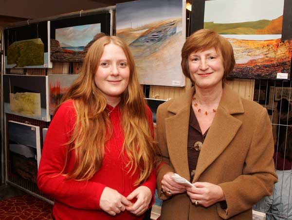 Artist Irene Hegarty, Crossmolina and Deirdre Mullen, Castlebar pictured with some of Irene's exhibits at the Castlebar Rotary Club at the Castlebar Rotary Club Art sale (in conjunction with the Mayo Pink Ribbon Appeal) in Breaffy House Hotel, Castlebar. Photo:  Michael Donnelly