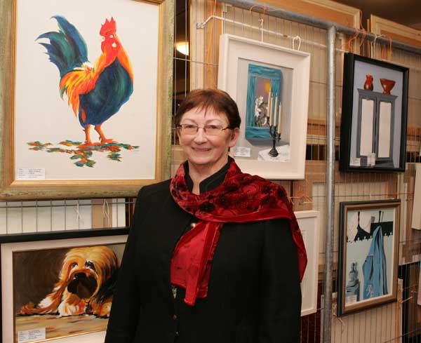 Charlestown Artist Maire N Riada pictured with some of her exhibits at the Castlebar Rotary Club at the Castlebar Rotary Club Art sale (in conjunction with the Mayo Pink Ribbon Appeal) in Breaffy House Hotel, Castlebar. Photo:  Michael Donnelly