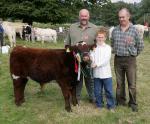 Jason Murphy Crossmolina with the  Reserve Champion  Shorthorn of Show at Ballinrobe Agricultural Show, included in photo are Judges Donie McKeon, Enniscrone, and Michael D'Arcy Oughterard.  Photo: Michael Donnelly.