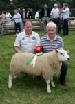 Paul Coyne Kilmaine (on right)  with the  Reserve Champion Sheep at Ballinrobe Agricultiural Show included is Willie Connolly Sheep steward and Safety officer. Photo: Michael Donnelly.