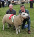 Michael Jennings Ballygarries Hollymount pictured with his Champion sheep of show at Ballinrobe Agricultural Show included in photo on left is Sean Brennan Sheep Judge. Photo: Michael Donnelly.