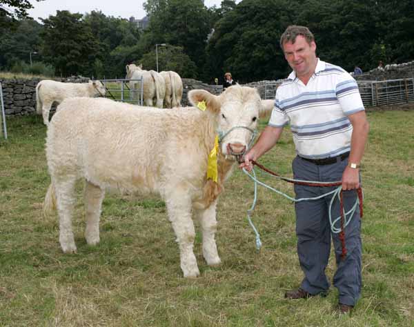 Tommy Keane, Drimurla Newport pictured wth his prizewinning purebred Charolais  Heifer at Ballinrobe Agricultural Show. Photo: Michael Donnelly.