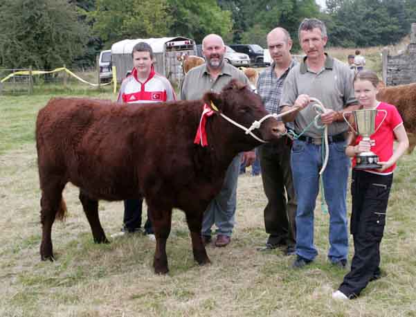 Padraic and Ruth Chalke Castleburke Clogher Claremorris on right with the Kelly Tractors Cup for Champion Shorthorn Heifer at Ballinrobe Agricultural Show, inclided in photo from left are Aaron Clalke and Judges Donie McKeon, Enniscrone, and Michael D'Arcy Oughterard. Photo: Michael Donnelly.