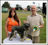 Stephen Loughney, Ballina with Phil Champion Dog (Miniature Schnauzer) at the 88th Claremorris Agricultural Show, included on left is Marie Mullen, Roscommon, (judge). Photo:  Michael Donnelly