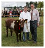 Gavin Kelly, Ballygawley, Co Sligo who won the Young Stockman at the 88th Claremorris Agricultural Show is pictured with Michael Fox, Tullamore (judge). Photo:  Michael Donnelly