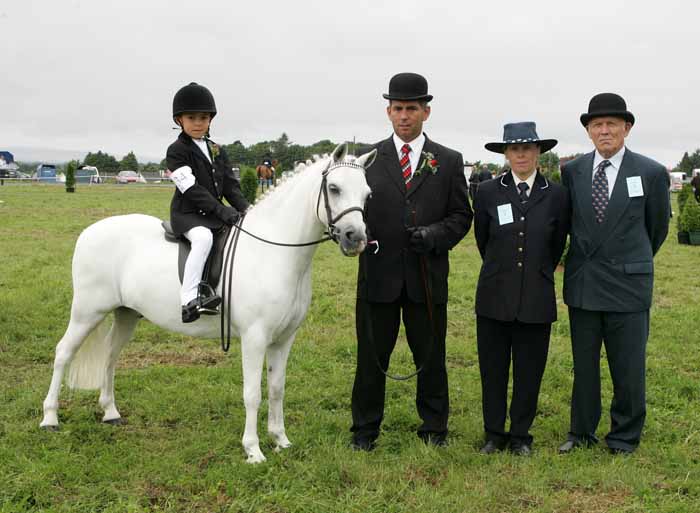 Richard Grimes on Bubbles was runner up in the U-10 Lead Rein Class led by Liam Grimes Enniscrone, at the 88th Claremorris Agricultural Show included in photo are  Mary Dooner and Michael (Judges). Photo:  Michael Donnelly 