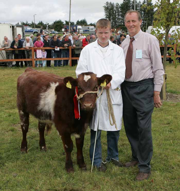 Gavin Kelly, Ballygawley, Co Sligo who won the Young Stockman at the 88th Claremorris Agricultural Show is pictured with Michael Fox, Tullamore (judge). Photo:  Michael Donnelly