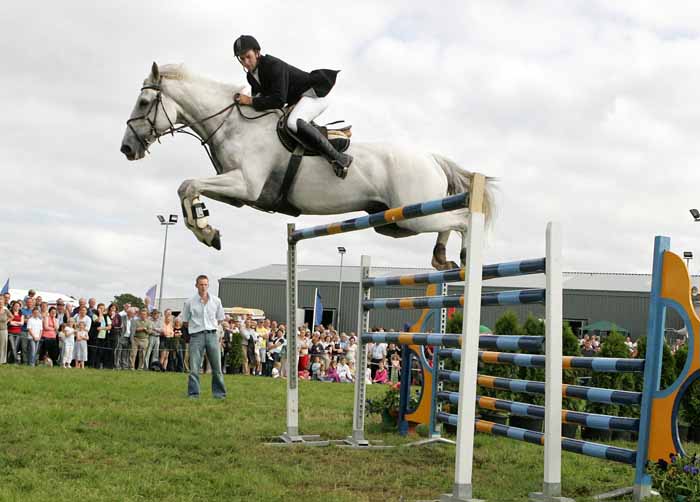 Damien Griffin, Ahascragh Ballinasloe on Lissyegan Clover Diamond clears the huge 6ft 10 inch  jump to win the high jump competition at the 88th Claremorris Agricultural show. Photo: Michael Donnelly