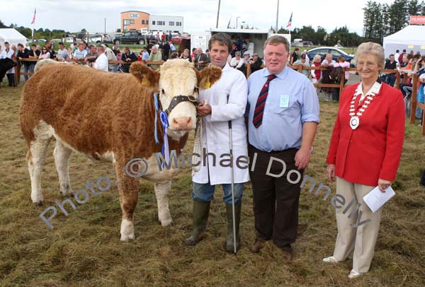 Joe Jordan, Bonniconlon, pictured at Claremorris Agricultural Show with his heifer, 2nd in the All Ireland Pedigree Suckler Type Heifer Championship, (sponsored by Luke Gibbons Claremorris) included in photo are Brian McAllister, Ballymena (Judge) and Dorothea Lazenby, National Chairman Irish Shows Association. Photo:  Michael Donnelly