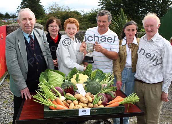 Desmond McLoughlin,  is presented with the Nevin Cup for "Best Collection of Vegetables from Garden"  at Claremorris Agricultural Show by Chris Flatley, Claremorris Show Committee (on behalf of the late Michael Nevin Claremorris) included in photo from left: Des and Kathleen Staunton, Desmond McLoughlin, Chris Flatley, Evelyn and Michael McLoughlin Ballyfarna, Claremorris. Photo:  Michael Donnelly  