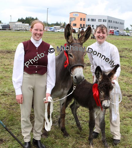 Claire Heneghan, Knocknagur Tuam and Caroline Turner, Milltown  with their prizwinning Donkey and foal at foot (sponsored by Temptations) at Claremorris Agricultural Show. They also qualified for the All Ireland Donkey Mare and Foal Championship in Ballinasloe Show on October 2nd. Photo:  Michael Donnelly
