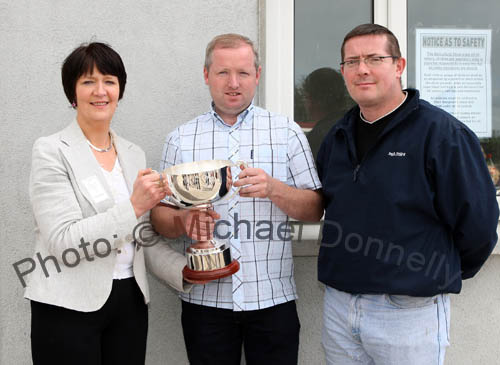 Paul Hunt (sponsor) presents the Martin Waldron Memorial Cup to Maureen Finnerty secretary Claremorris Agricultural Show, on right is Paul Hanley, Show Chairman. Photo:  Michael Donnelly