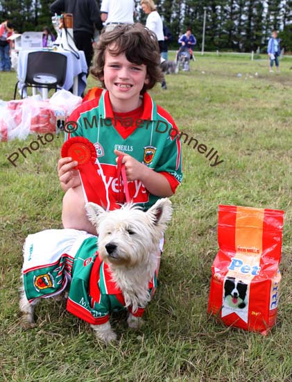 Luke Gibbons, Jnr. Claremorris had his dog well kitted out at Claremorris Agricultural Show. Photo:  Michael Donnelly