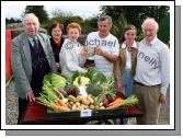 Desmond McLoughlin,  is presented with the Nevin Cup for "Best Collection of Vegetables from Garden"  at Claremorris Agricultural Show by Chris Flatley, Claremorris Show Committee (on behalf of the late Michael Nevin Claremorris) included in photo from left: Des and Kathleen Staunton, Desmond McLoughlin, Chris Flatley, Evelyn and Michael McLoughlin Ballyfarna, Claremorris. Photo:  Michael Donnelly  