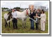 Vinura Lola wins class 20 (Best registered  Connemara 4-7 yr old mare with or without foal at foot) at Claremorris Agricultural Show, (Sponsored by Dani Boutique). Roger, Laura and Kate Brady Claremorris are presented with the "Guinness Cup"  at Claremorris Agricultural Show by Kevin and Sarah Jacobs, Co Laois (Judges). Photo:  Michael Donnelly