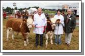 Qualifiers for the Western Simmental Club Calf Finals  at Ballinrobe Show on 2nd Sept (P.B.R. Bull Calf Class- born on or after 1st Jan 07) at Claremorris Agricultural Show were Patrick Bowens, Kilkelly and Elaine Hennelly, Cregconnell Rosses Point Sligo pictured with Joe Campbell (Judge).  Photo:  Michael Donnelly