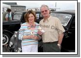 Enjoying an icecream beside the Vintage Cars at Claremorris Agricultural Show were Teresa and Brendan Smyth, Mid West Furniture Kilmeena, Westport. Photo:  Michael Donnelly