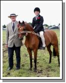 Cormac Hanley, Claremorris was the winnner of the U-12 ridden Class at Claremorris Agricultural Show pictured with judge Pascal Crawford. Photo:  Michael Donnelly