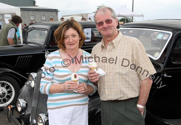 Enjoying an icecream beside the Vintage Cars at Claremorris Agricultural Show were Teresa and Brendan Smyth, Mid West Furniture Kilmeena, Westport. Photo:  Michael Donnelly