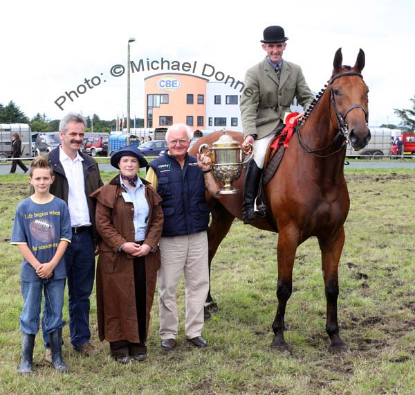 Cormac Hanley (sponsor) presents the Oliver Dixon Gold Cup at Claremorris Agricultural Show to Fergal Birrane Killala for Champion Hunter under Saddle. Included in photo from left Patrick and P.J Munnelly, Athlone (owner) and Jessica Tanner, Judge.  Photo:  Michael Donnelly