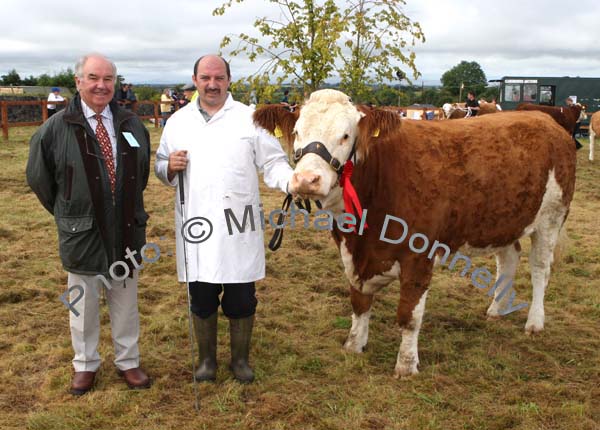 Joe Campbell, Strabane, (Judge) pictured with Martin Regan Cloonfad, with his prizewinning  Senior Heifer at Claremorris Agricultural Show (sponsored by Western Simmental Club). Photo:  Michael Donnelly