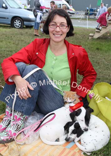 Holly Brunette, Claremorris, pictured with her Kitten "Marmalade" and dogs Siucra and Brandy, at Claremorris Agricultural Show. Photo:  Michael Donnelly
