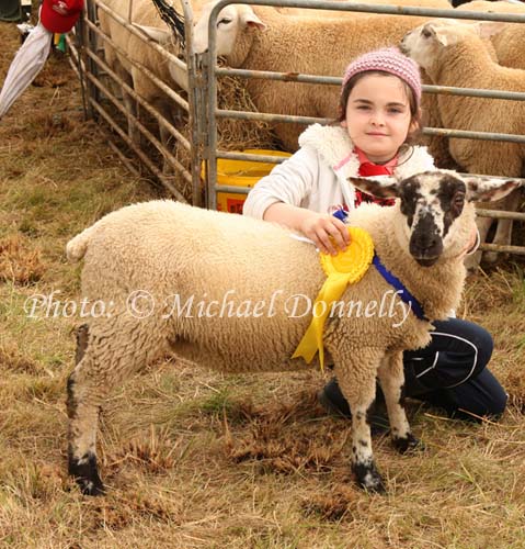 Orla Brennan, Shessaugh Taugheen pictured with her pet lamb at Claremorris Agricultural Show. Photo: Michael Donnelly.
