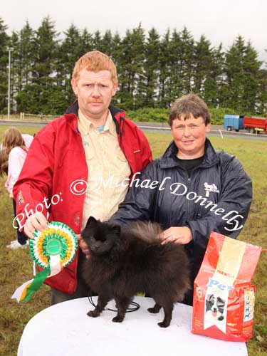 Sandra Mullarkey, with "Blackie"  a black Pomeranian, Champion Dog of Show at Claremorris Agricultural Show and Michael Mullins Lecarrow Co Roscommon (Judge). Photo: Michael Donnelly.