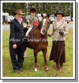 Patricia Hoey, (Judge)   presents 1st prize to Ben Crawford Corofin  on Tabita Pollyanna winner of Lead Rein at Claremorris Agricultural Show led by Claire Crawford, Corrofin, Co. Galway. Photo:  Michael Donnelly
