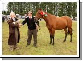 John Joyce, (sponsor)  presents the Michael Joyce Memorial Cup for Champion Young Horse of the Show (3 years old and under) to Pat Carty, Athlone at Claremorris Agricultural Show. Photo:  Michael Donnelly