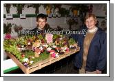 Jarlath Bell, Hollymount pictured at Claremorris Agricultural Show with his grandmother Birdie Bell, and his prizewinng "imaginative presentation of a garden on a tray or board not exceeding 30 x 20 inches using rock, bog or any other novel background" Photo:  Michael Donnelly 