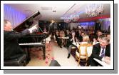 Composer, songwriter and pianist Phil Coulter  finishes off a song to the applause of the invited audience at the official opening of Days Hotel "The Harlequin", Castlebar. Photo:  Michael Donnelly