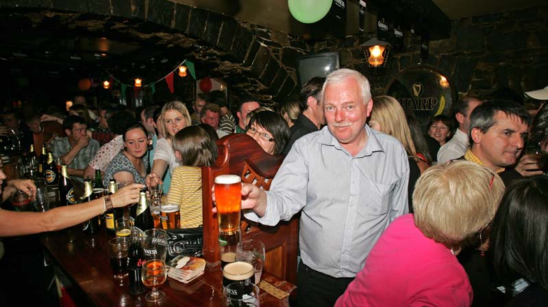 Tom Lyons gets his last pint in the Humbert Inn, Castlebar on Sunday Night last, as the Humbert closed it doors for the last time. Photo:  Michael Donnelly