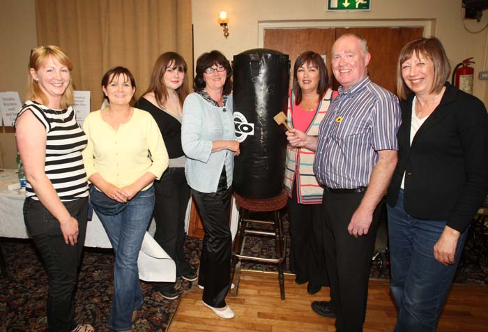 Auctioneer Cllr Joe Mellett pictured with a Punchbag signed by "Sugar Ray Leonard"  (one of the many items at the 24 Hour Auction in Julians of Midfield Swinford  in an attempt to break the world record in the Guinness Book of Records, from left: Kathleen Brennan, Margaret Julian, Mary McHale Roe, Madeleine Brennan, Carmel McHale Roe Joe Mellett and Marian Newman
from left: