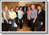 Auctioneer Cllr Joe Mellett pictured with a Punchbag signed by "Sugar Ray Leonard"  (one of the many items at the 24 Hour Auction in Julians of Midfield Swinford  in an attempt to break the world record in the Guinness Book of Records, from left: Kathleen Brennan, Margaret Julian, Mary McHale Roe, Madeleine Brennan, Carmel McHale Roe Joe Mellett and Marian Newman
from left:
