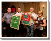 Auctioneers Joe Mellett and Matt Duggan Swinford  pictured with TJ Kelly and Kathleen Brennan of Midfield Development Association displaying Framed Jerseys, some of the many items at the 24 Hour Auction in Julians of Midfield Swinford in an attempt to break a record in the Guinness book of Records.Photo:  Michael Donnelly