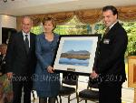 Sean Reid, Chairman Mayo Associations Worldwide Convention 2011 committee makes a presentation to President Mary McAleese and Dr Martin McAleese after she performed the official opening of the Convention in Hotel Westport, Westport. Photo: © Michael Donnelly 2011