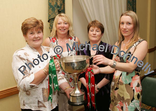 Castlebar ladies pictured with the Cup at the Castlebar Mitchels Ladies Football Club Fashion Show in the Failte Suite, Welcome Inn Hotel, Castlebar, from left: Bernadette Daniel, Brid Healy, Breege Ormsby and Orla Hughes. Photo:  Michael Donnelly
