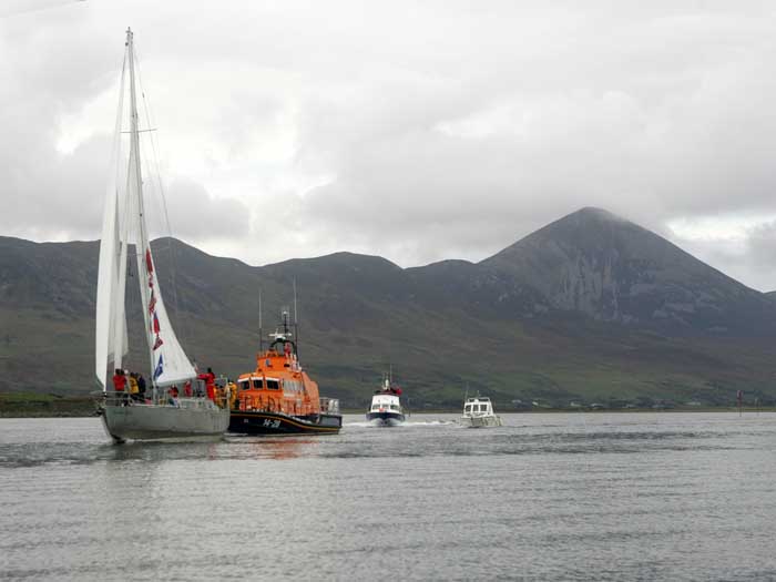 The Northabout and crew sail past Croagh Patrick (The Reek) on their way into Westport harbour after completing their historic voyage around the Artic Ice cap via the North West passage. She is escorted into Westport Harbour by the Achill lifeboat RNLB "Sam and Ada Moody" and other local boats.  Photo: Michael Donnelly.