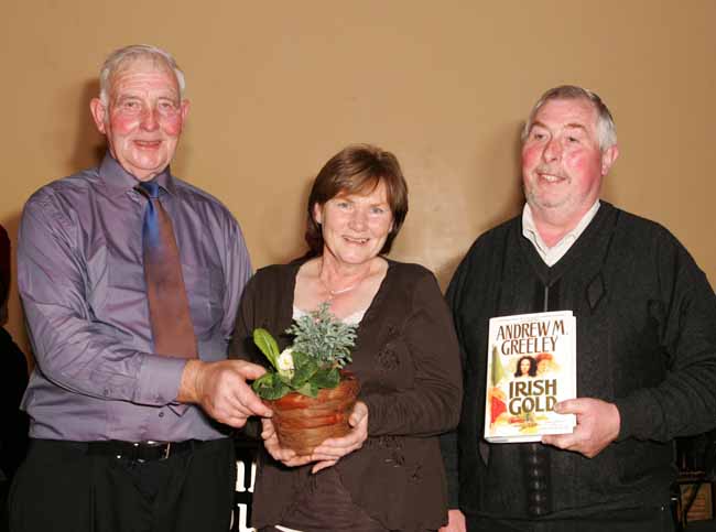 Paddy Walsh, Kilmaine makes a presentation to Ann and Michael O'Malley Ballinrobe, President  Western Vintage Tractor and Engine Club) at the Threshing Social in the Dalton Inn Hotel Claremorris.  Photo: Michael Donnelly.