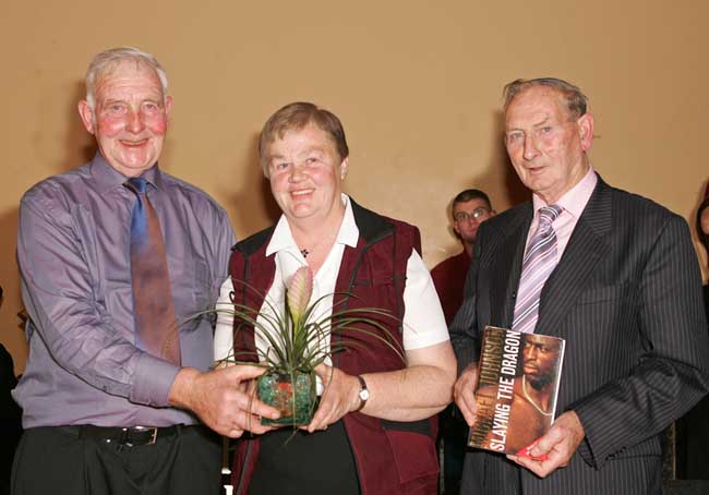 Paddy Walsh, Kilmaine makes a presentation to Celia and Paddy Lyons Ballyhaunis at the Threshing Social in the Dalton Inn Hotel Claremorris.  Photo: Michael Donnelly.