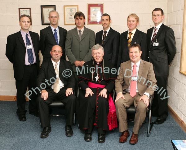 Directors of CBE pictured at the official opening and blessing of CBE's new Head Office and Research and Development Centre IDA Business Park Claremorris, front from left: Sean Kenna, Group Director; Archbishop of Tuam Dr Michael Neary, D.D., who performed the official opening and blessing; Seamus Murray, Financial Controller and group Director;  at back: James Forde, Dominic Feeney, Cathal Concannon, T.J. McHugh, John Henry and Michael Cattigan. Missing from photo was Kathleen Joyce-Tierney Director. Photo:  Michael Donnelly