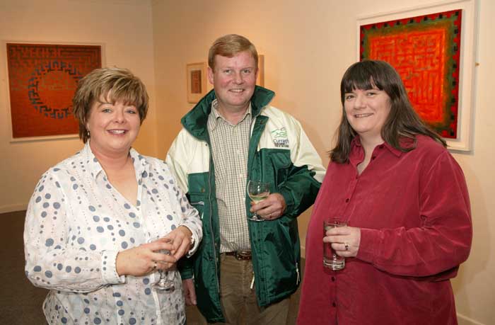 Pictured at the official opening of an exhibition of paintings by Gavin Hogg in the Linenhall Art Centre Castlebar, from left:Mary  Philbin,  Niall Malone and Maura Connolly, administrator Linenhall Arts Centre. Photo Michael Donnelly 
